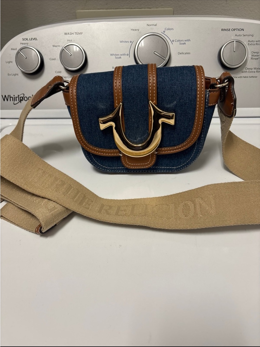 True Religion Denim Crossbody with Gold Hardware and Tan Accents